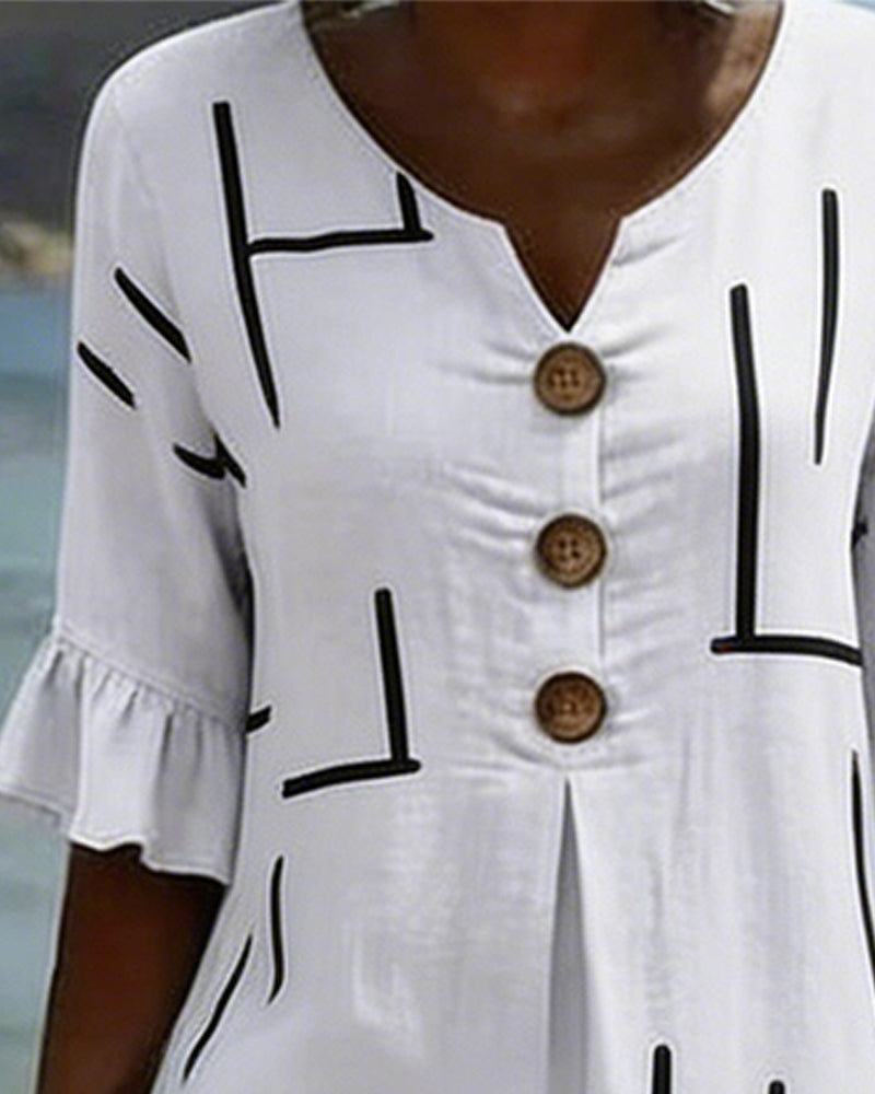 Kleid Mit Geometrischen Linien Und V-Ausschnitt