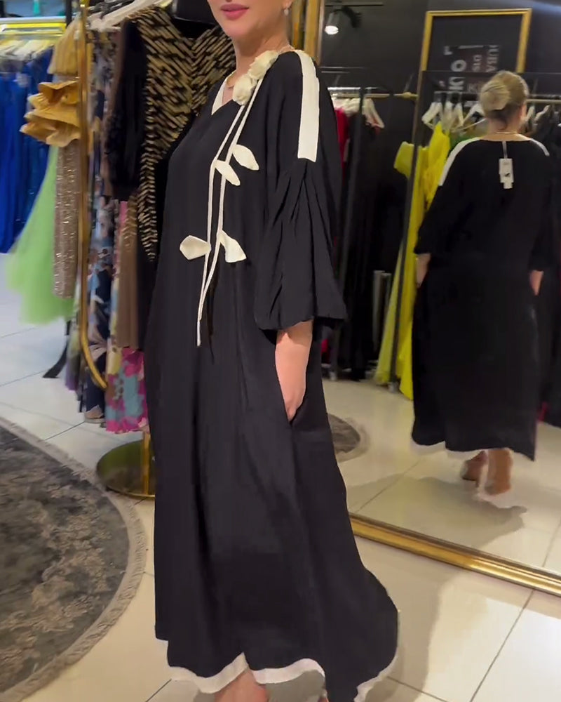 Modisches, lockeres kleid mit dreidimensionalem blumenmuster in kontrastfarbe