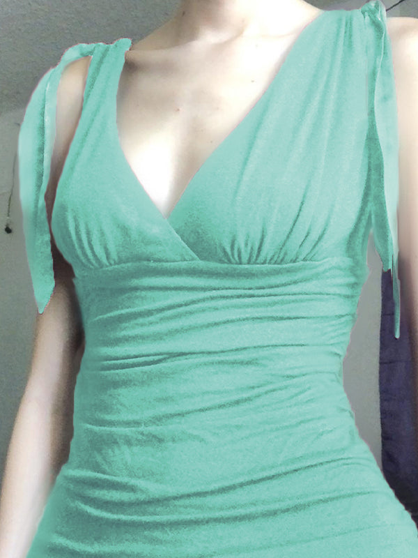 Sleeveless vintage top in plain purple with crossed V-neck