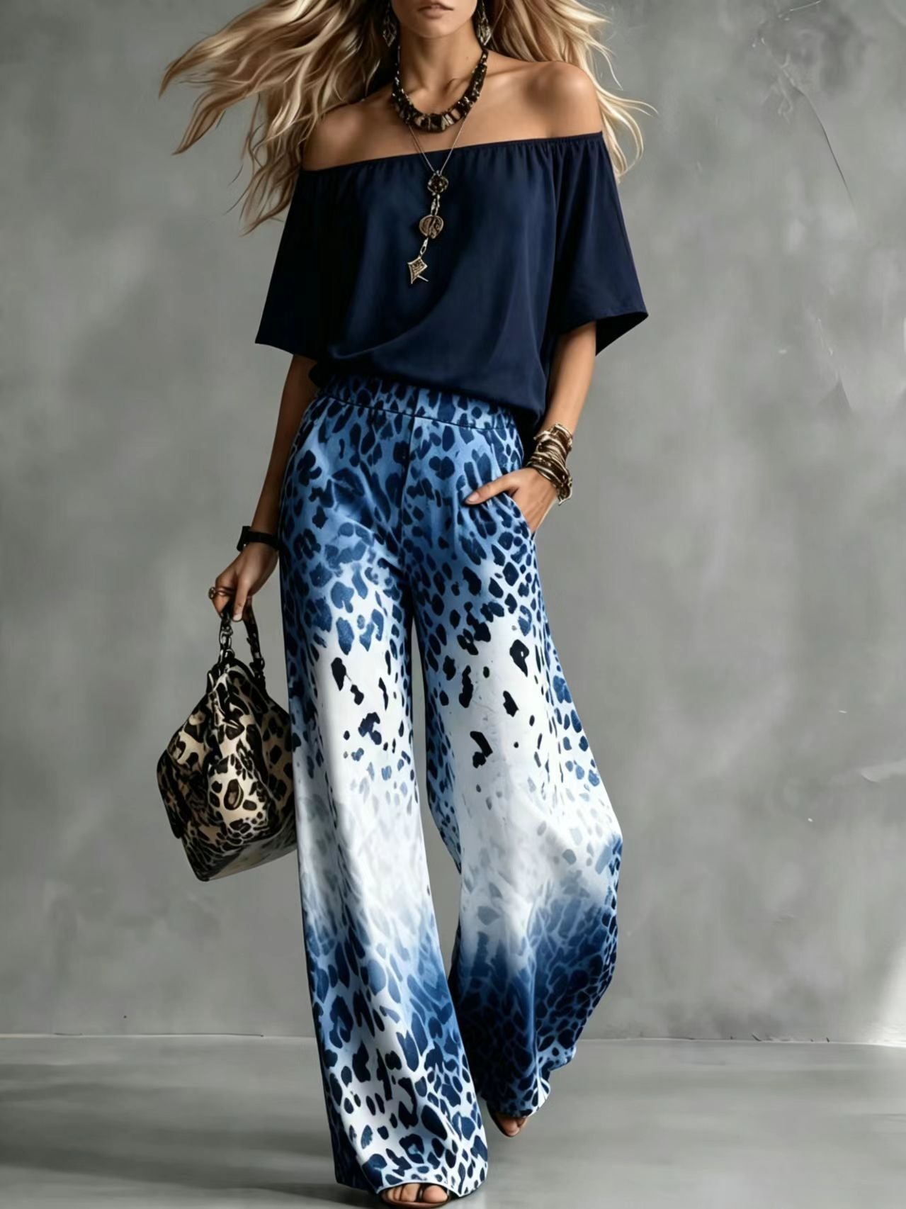 Set aus einem Top mit U-Ausschnitt und schulterfreiem Schnitt sowie einer weiten Hose mit Leopardenmuster und Ombré-Effekt