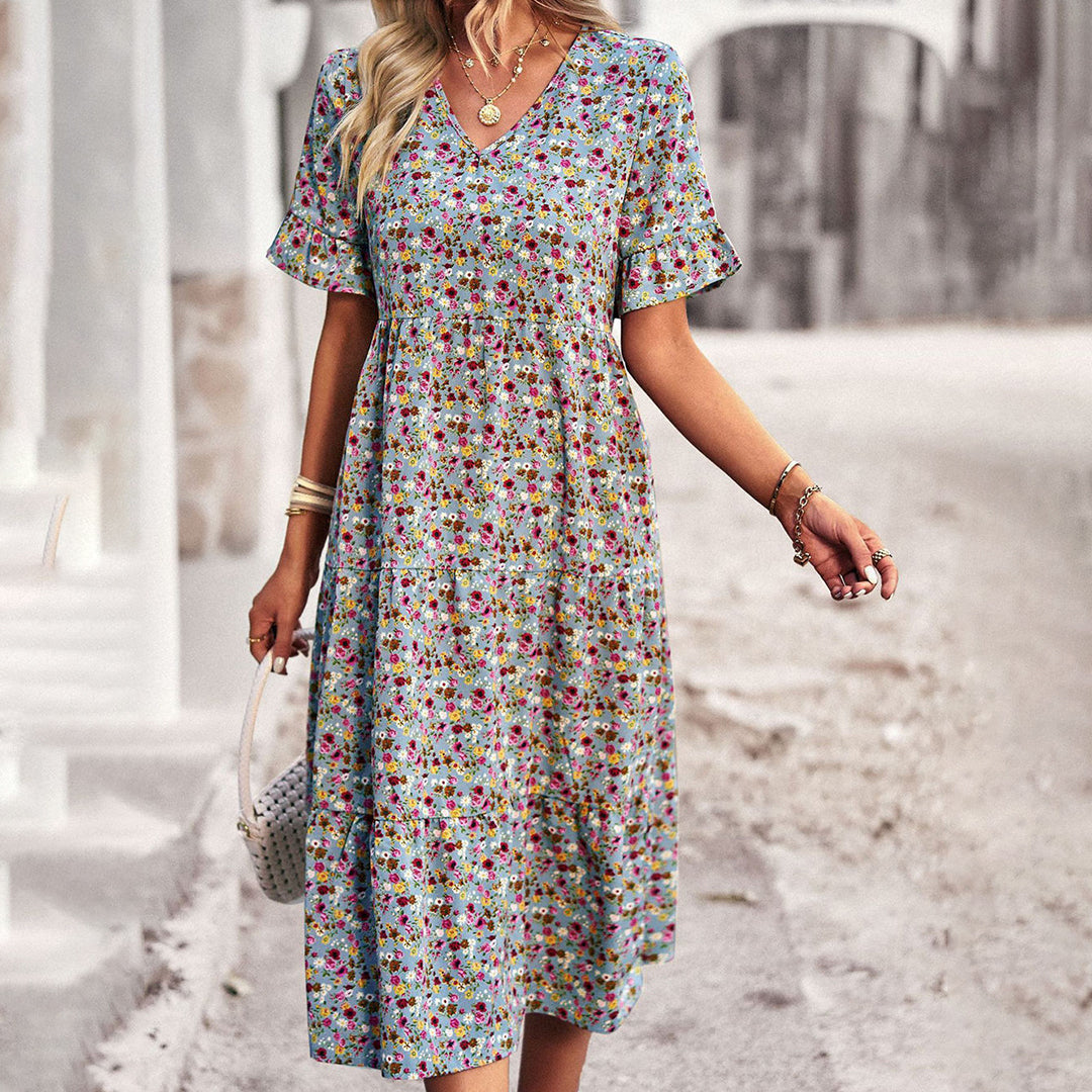 Lena – Playful summer dress in apricot with floral print