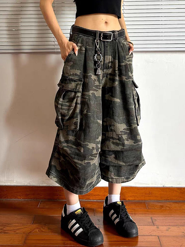 Green vintage shorts made of aged denim in scimitar style