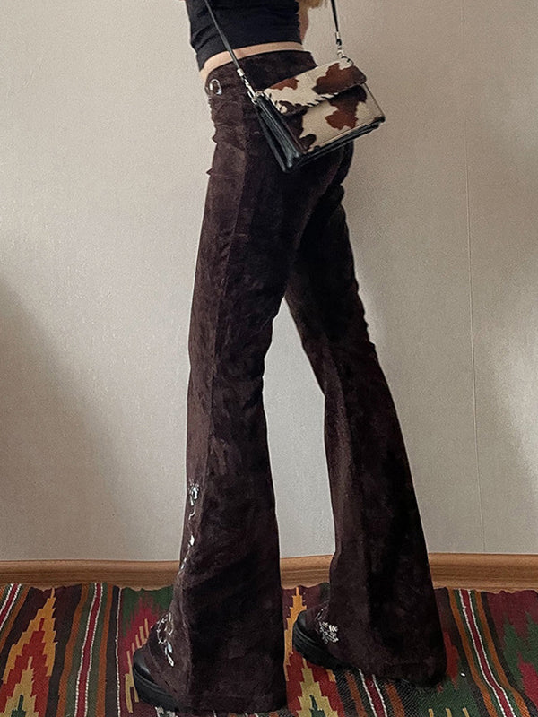 Brown vintage flared jeans with embroidery flap detail waistband