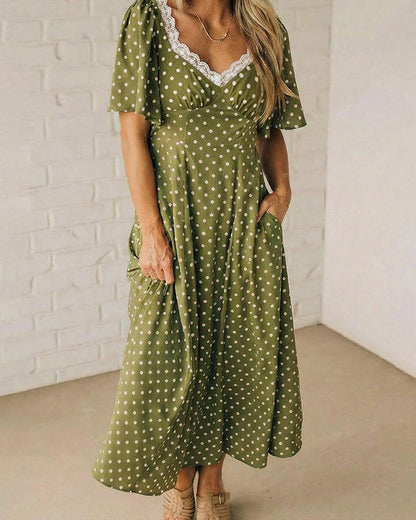 Kleid mit Spitze und Polka-Dots V-Ausschnitt
