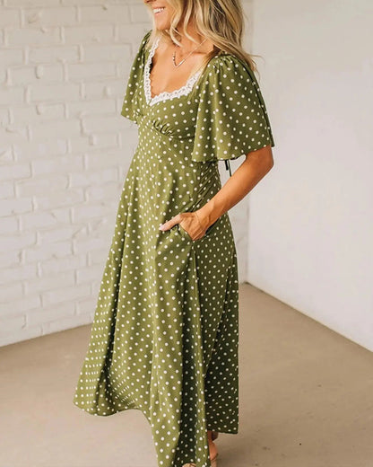 Kleid mit Spitze und Polka-Dots V-Ausschnitt