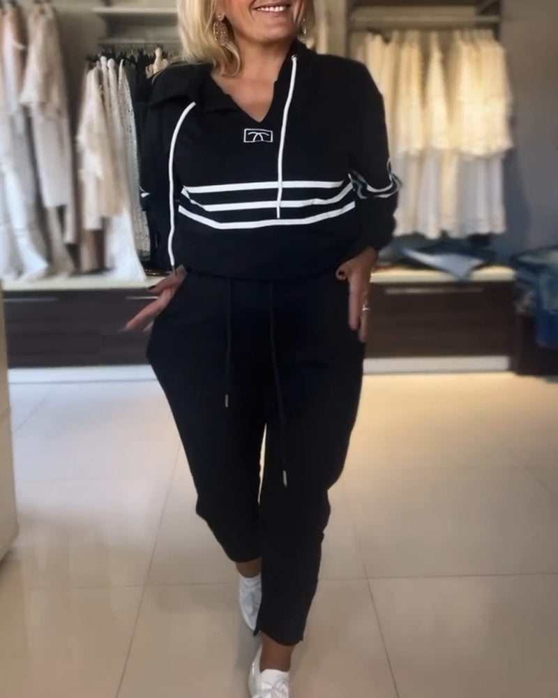 Lässiges kapuzenpullover-set mit streifenmuster