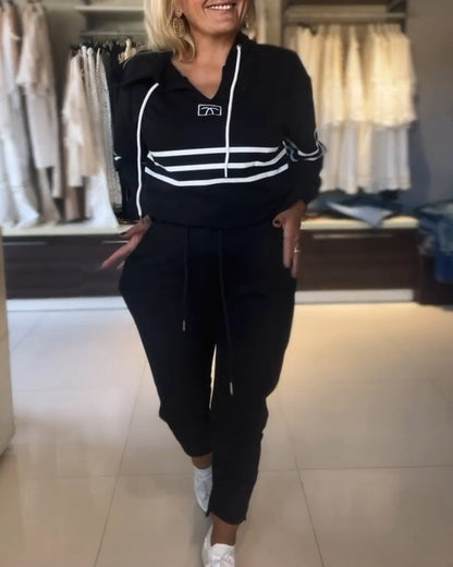 Lässiges kapuzenpullover-set mit streifenmuster