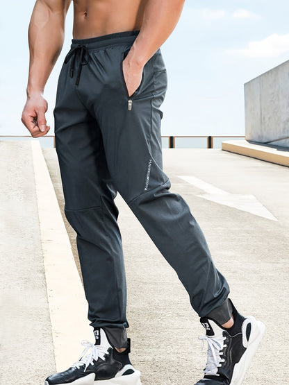 Dark grey sweatpants with zip pockets - Elias