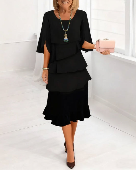 Kleid stylisch runder Ausschnitt etagen
