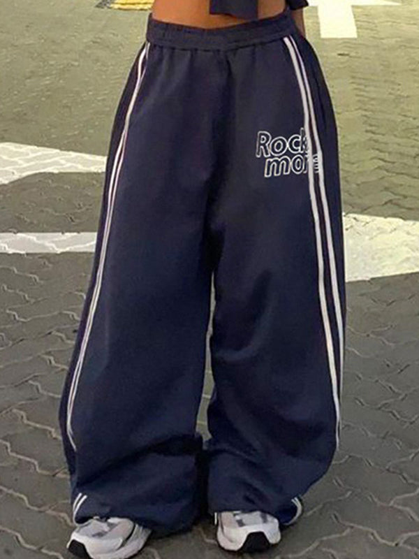 Pantalon streetwear bleu marine des années 90 à rayures et jambes larges