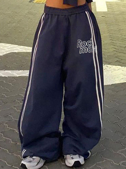 Pantalon streetwear bleu marine des années 90 à rayures et jambes larges