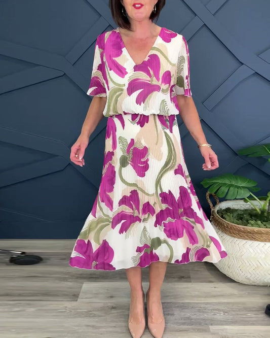 Kleid mit blumendruck und v-ausschnitt