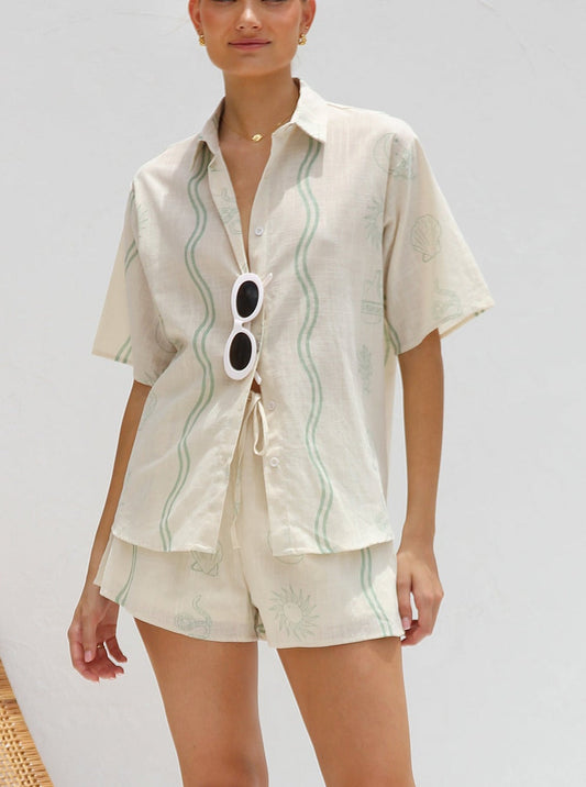 Set in cream with delicate stripes and sea motifs - Luana