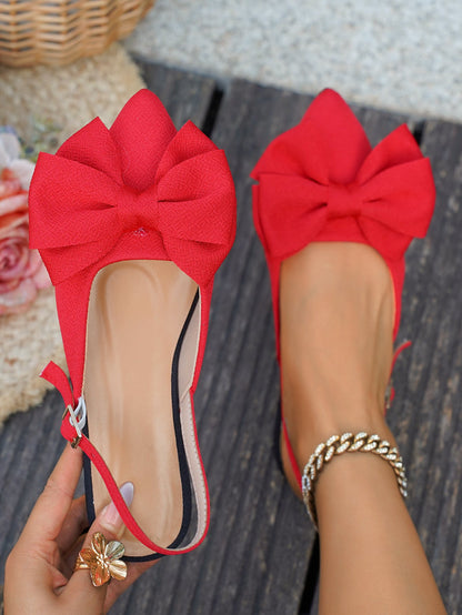 Large bow pointed toe flat heel sandals
