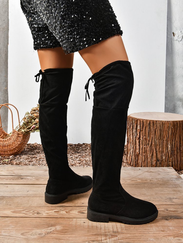 Black elastic flat over-the-knee boots