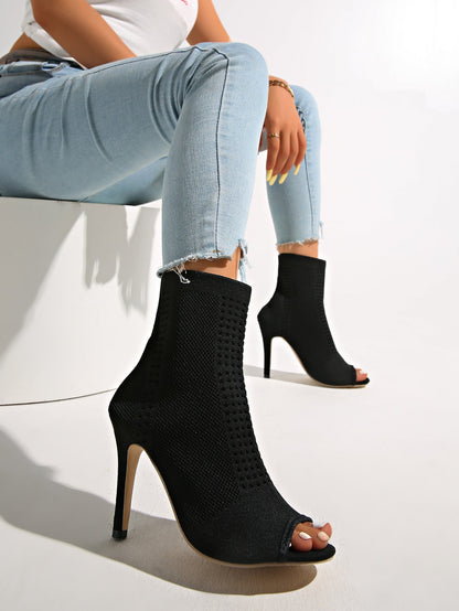Neo-Noir Stiletto open-toe knitted sock boots