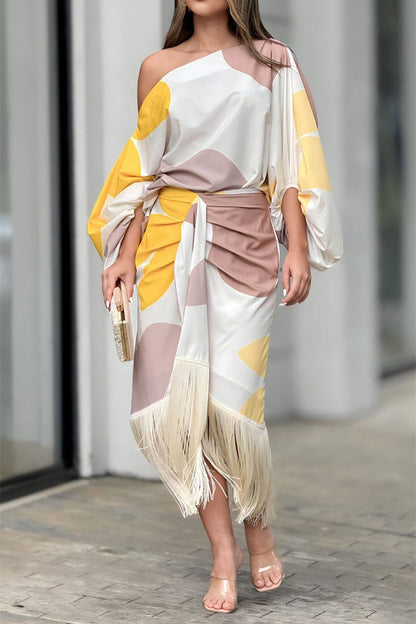 Printed lantern-sleeve loose top and fringed hem skirt two-piece set