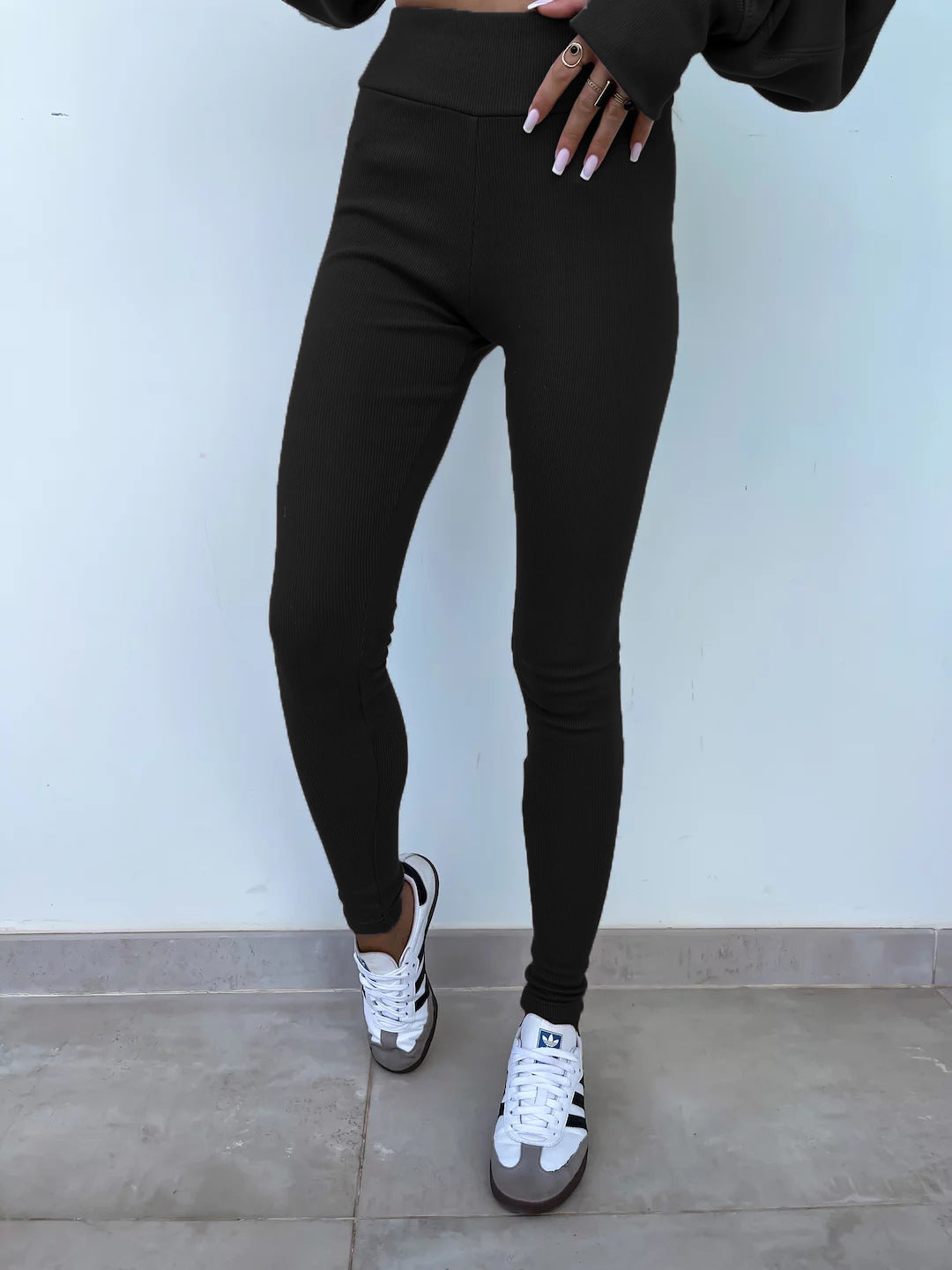 Loose long-sleeved round neck slit top and tight pants two-piece set