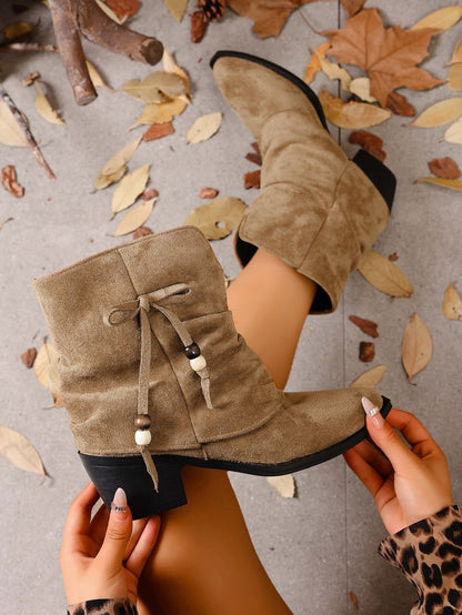 Side bow tie embellishment suede ankle boots