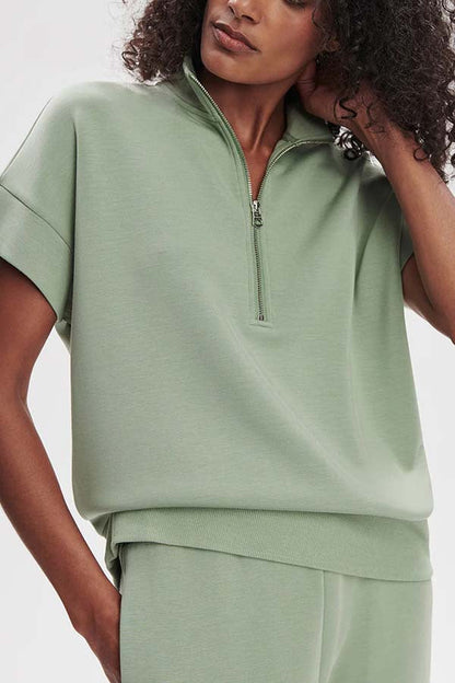 Stand-up collar half-zip short-sleeve top and tapered sweatpants two-piece set