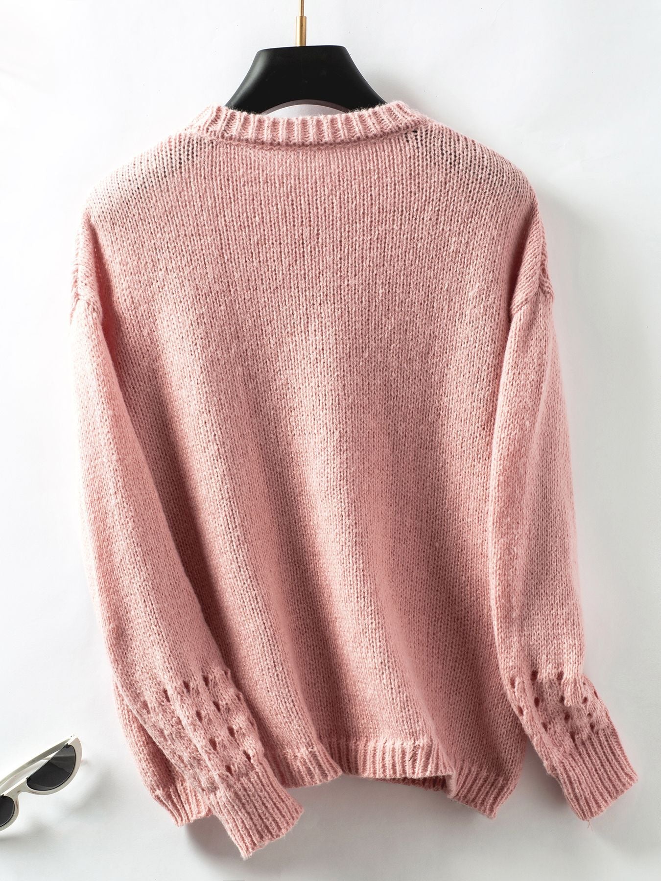 Solid color hollow knit pullover sweater