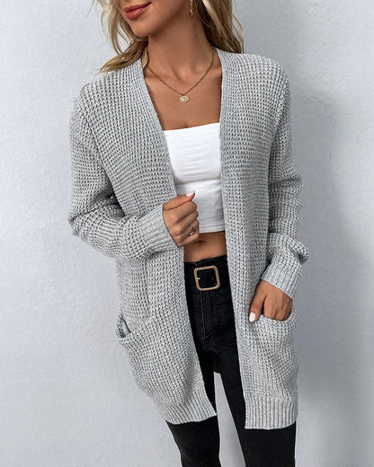 Solid color pocket mid-length knitted cardigan