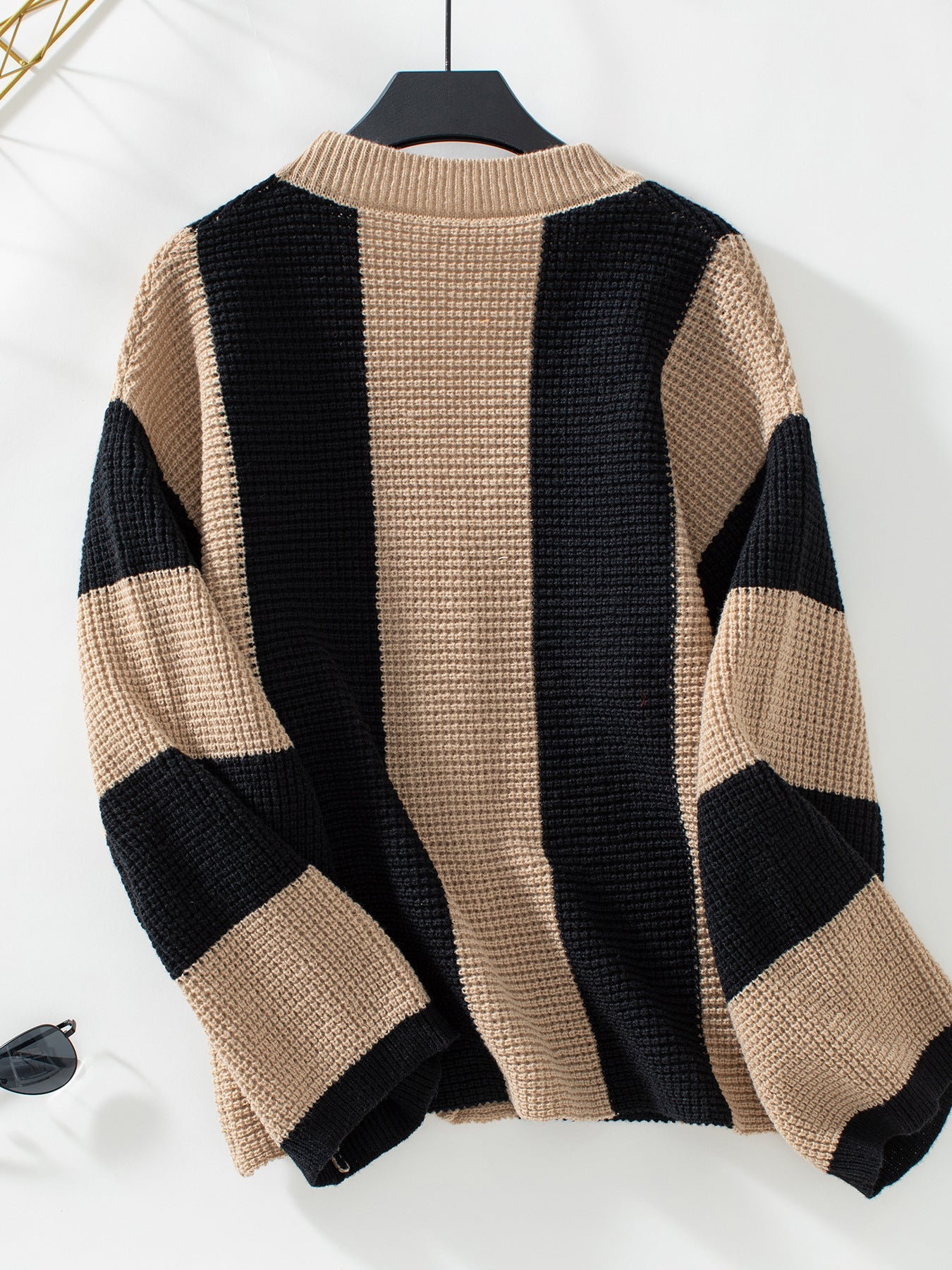 Loose vertical striped button-down knitted cardigan