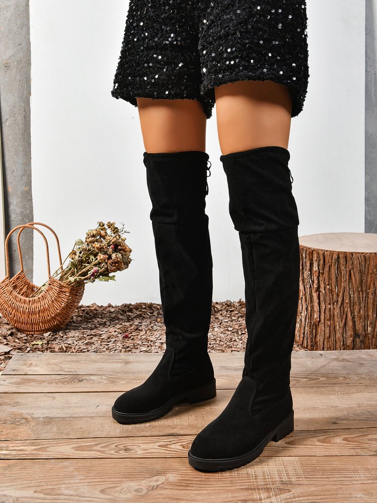 Black elastic flat over-the-knee boots