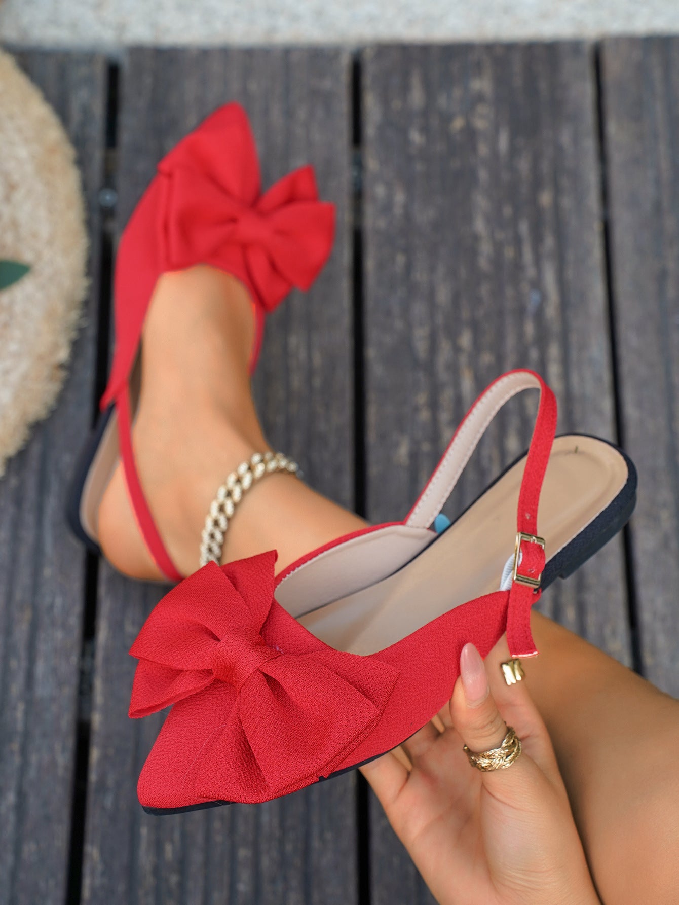Large bow pointed toe flat heel sandals