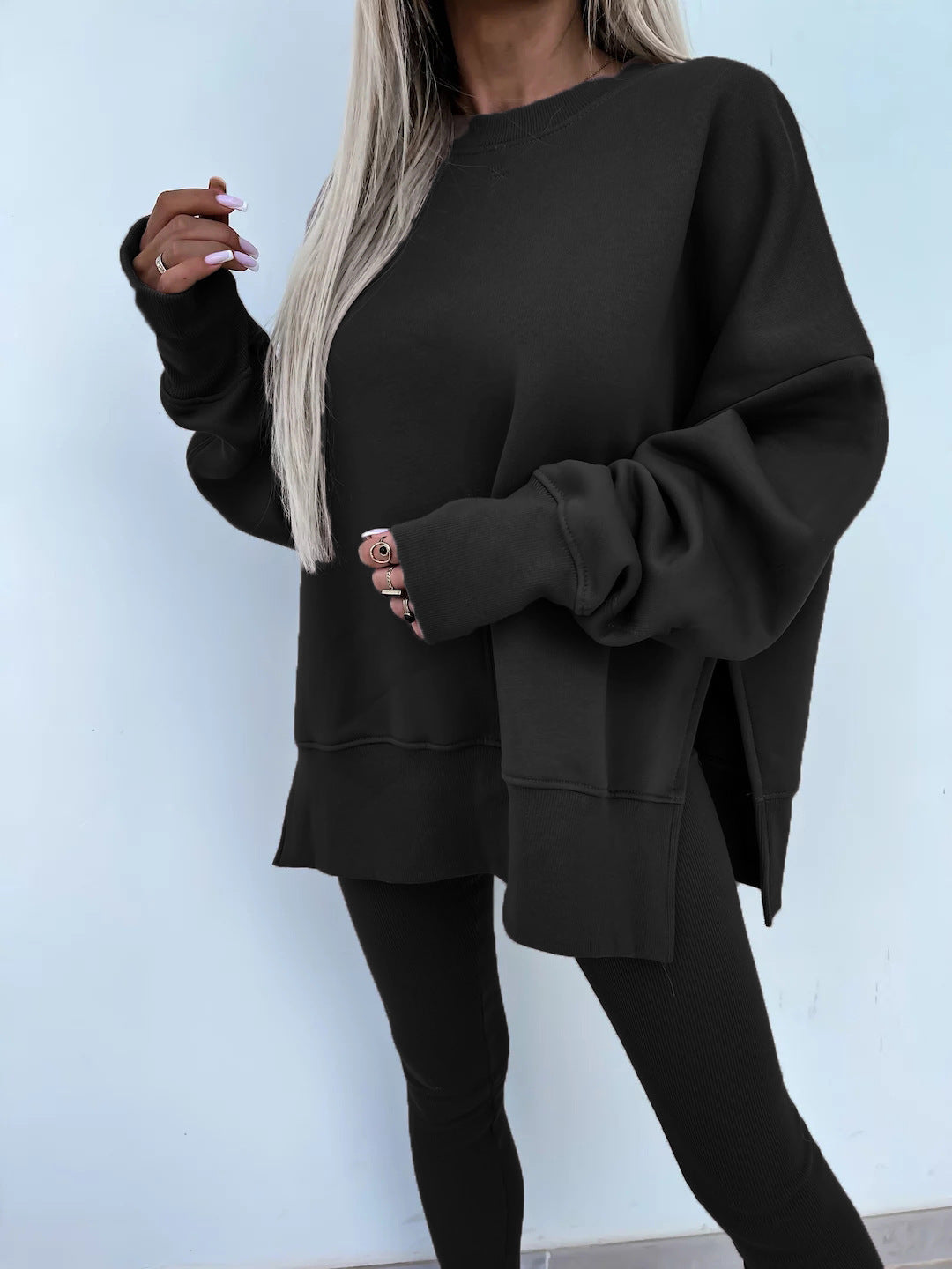 Loose long-sleeved round neck slit top and tight pants two-piece set