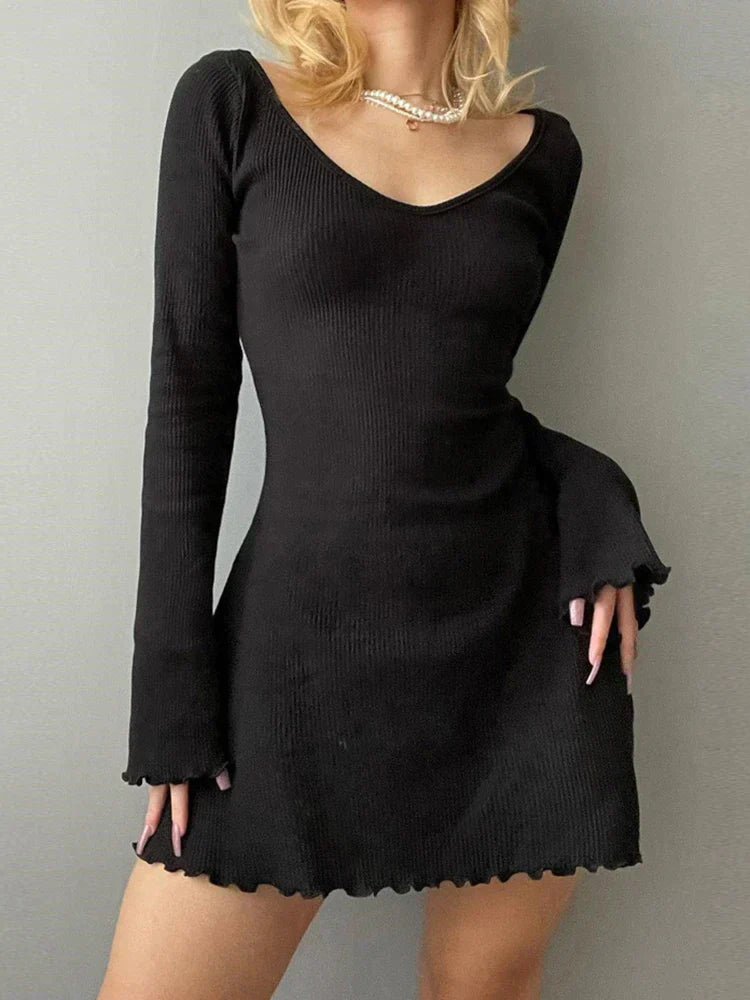 Zoe Elegance: Black knitted dress with charming bell sleeves