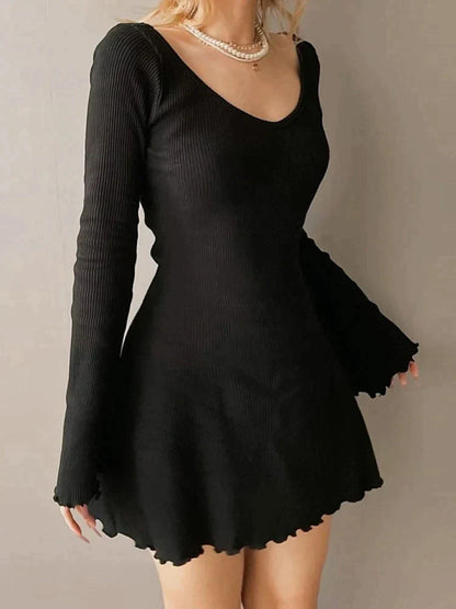 Zoe Elegance: Black knitted dress with charming bell sleeves