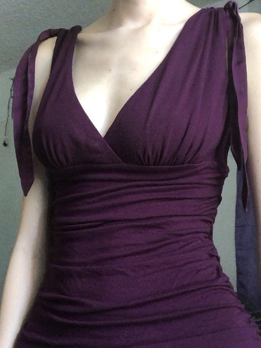 Sleeveless vintage top in plain purple with crossed V-neck