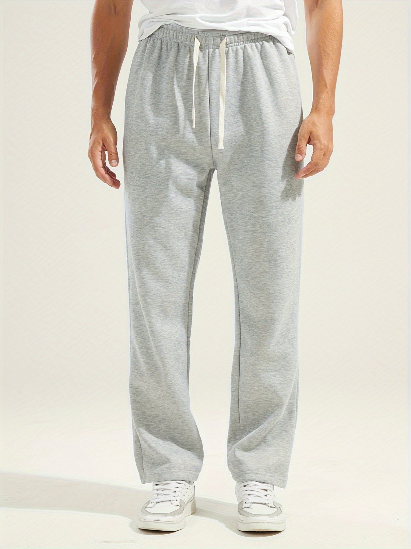 Black sweatpants with drawstring and wide cut - Tom