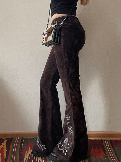 Brown vintage flared jeans with embroidery flap detail waistband