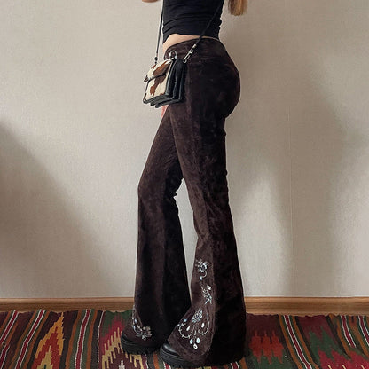 Brown vintage flared jeans with embroidery flap detail waistband