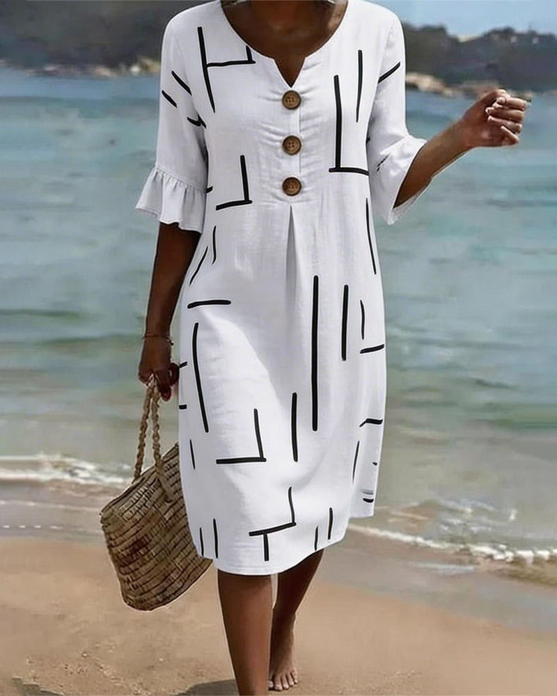 Kleid Mit Geometrischen Linien Und V-Ausschnitt