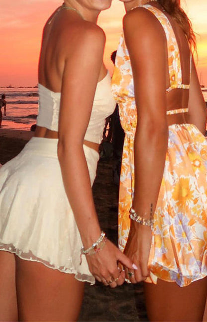 Giovanna Orangefarbenes Minikleid mit Blumenmuster