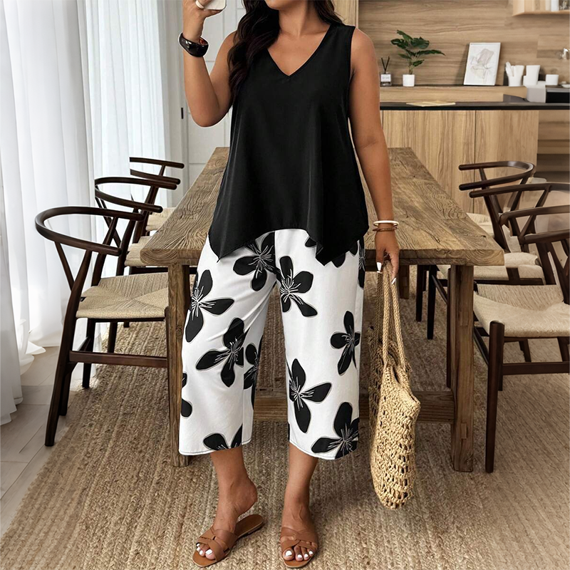 👚🌸 NUR FÜR KURZE ZEIT: 50% RABATT! Set aus asymmetrischem Damenoberteil & Caprihose mit Blumenmuster – Vielseitig, farbenfroh, bequem 🌺